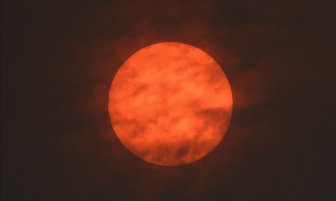 The sun is seen after dawn near Exeter. Photograph: Toby Melville/Reuters
