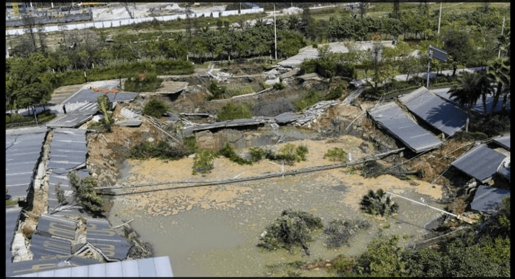 Massive sinkhole swallows eight-lane road in China, leaving at least eight&nbsp;dead